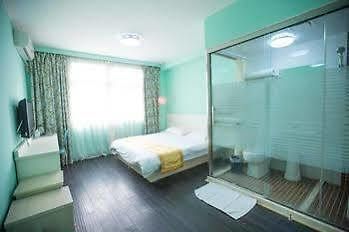Qingdao Aisen Apartment Hotel Екстер'єр фото