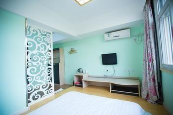 Qingdao Aisen Apartment Hotel Екстер'єр фото