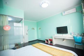 Qingdao Aisen Apartment Hotel Екстер'єр фото
