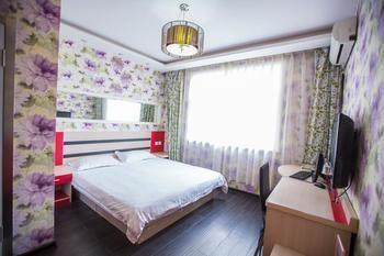 Qingdao Aisen Apartment Hotel Екстер'єр фото