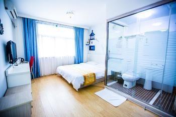 Qingdao Aisen Apartment Hotel Екстер'єр фото