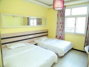 Qingdao Aisen Apartment Hotel Екстер'єр фото
